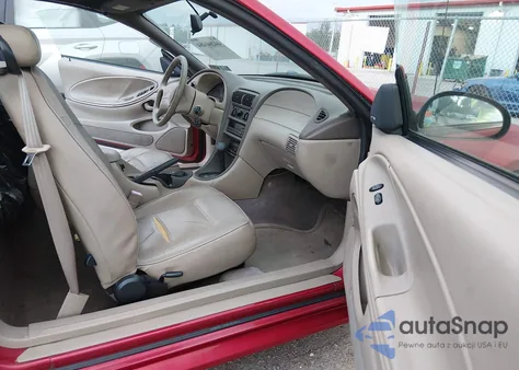 1999 Ford Mustang z USA, uszkodzony, nr VIN 1FAFP444XXF221757